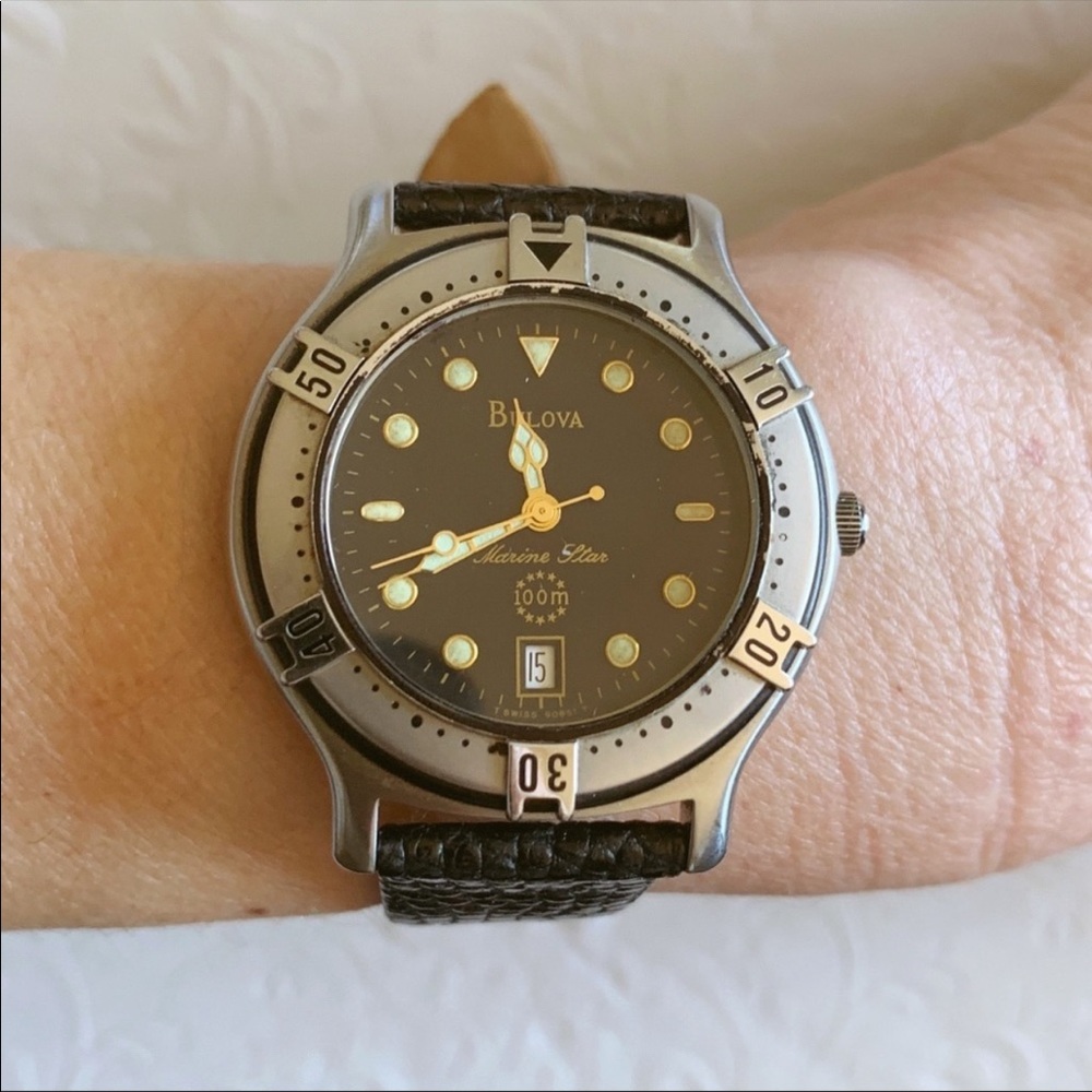 Bulova stainless water resistant lizard watch